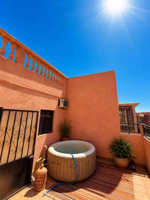 Appartement 2 chambres climatisé jacuzzi privé