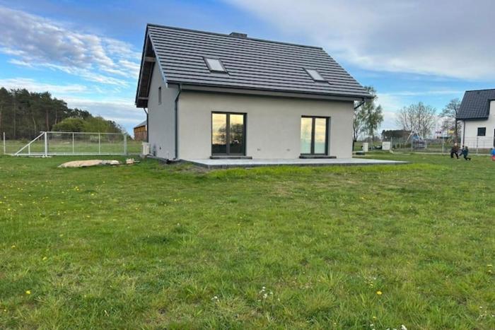 Half of a holiday home with a large garden