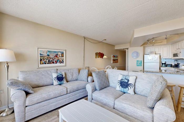 Desirable beach condo with great location views balcony pools & game room