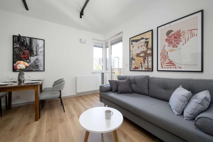 Stylish Apartment with Balcony and Underground Parking by Noclegi Renters