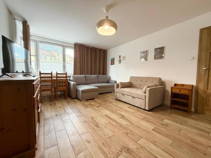 Jedności Narodowej Urban Apartment by BookingHost