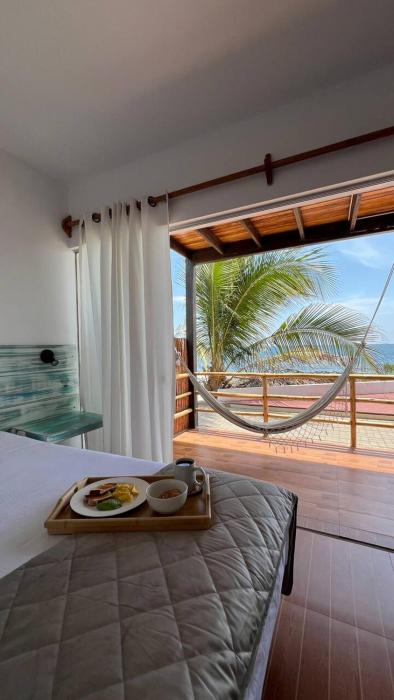 Apartamento con terraza frente al mar