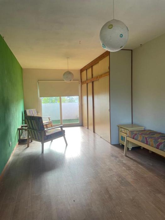 Un refugio íntimo Anexo en planta alta