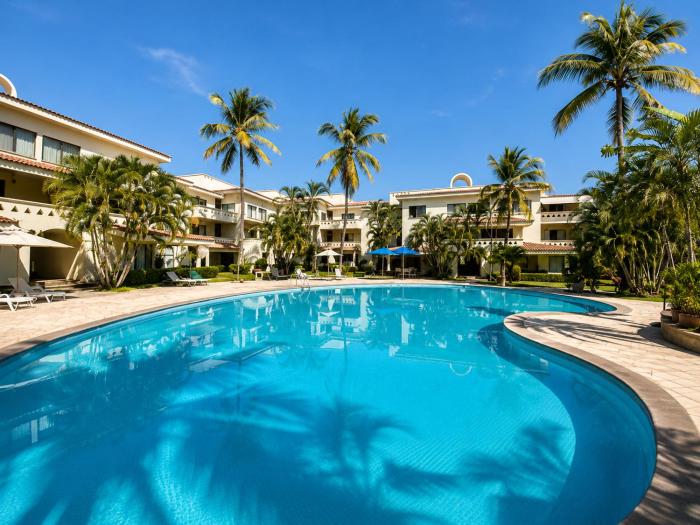 Hermoso apartamento en Manzanillo con alberca y cancha de tenis, Ideal para relajarse y disfrutar de una escapada tranquila en el paraíso tropical