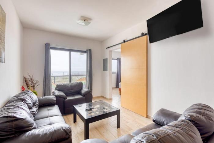 Ocean View Condo with Scenic Balcony, well-equipped Kitchen, Internet & WD
