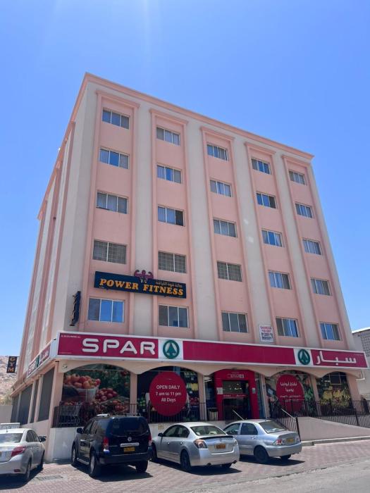apartment ruwi, spar,gym building