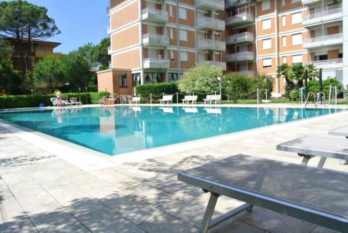 Stylish pool view flat with two terraces