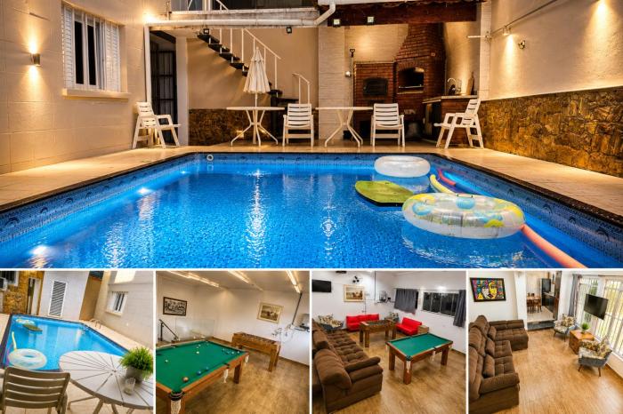 Belíssima Casa a Beira Mar com Piscina Aquecida Cobrado a Parte, 5 Quartos com Ar Condicionado, Amplo Salão de Jogos com Mesas de Bilhar e Pebolim, Amplo Espaço Externo com Churrasqueira em Deck Gourmet Coberto frente a Piscina,Tudo isso á Beira 