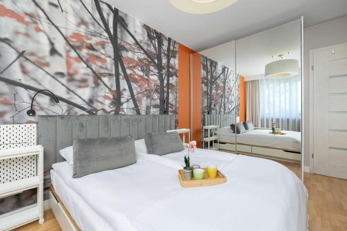 Comfortable Apartment with Air Conditioning and Balcony by Noclegi Renters