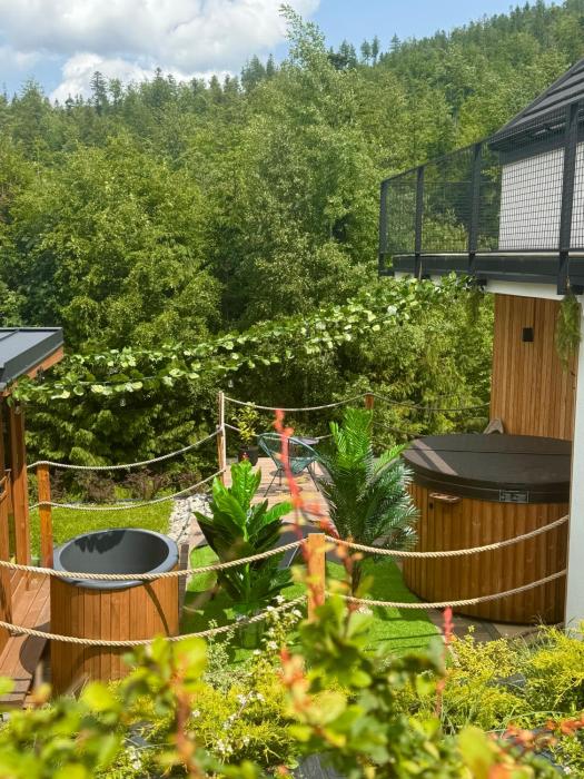 Domki Dwa jelonki - balia z jacuzzi i sauna