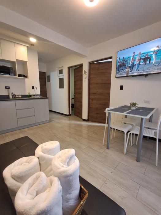 7min del Parque Central, céntrico, impecable, parqueo-2 Habitaciones