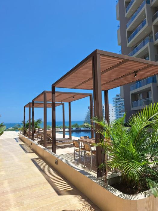 Exclusivo apartasuite con terraza y vista al mar - Bello Horizonte