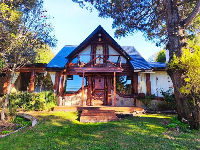 Casa con vista al lago y suite con jacuzzi