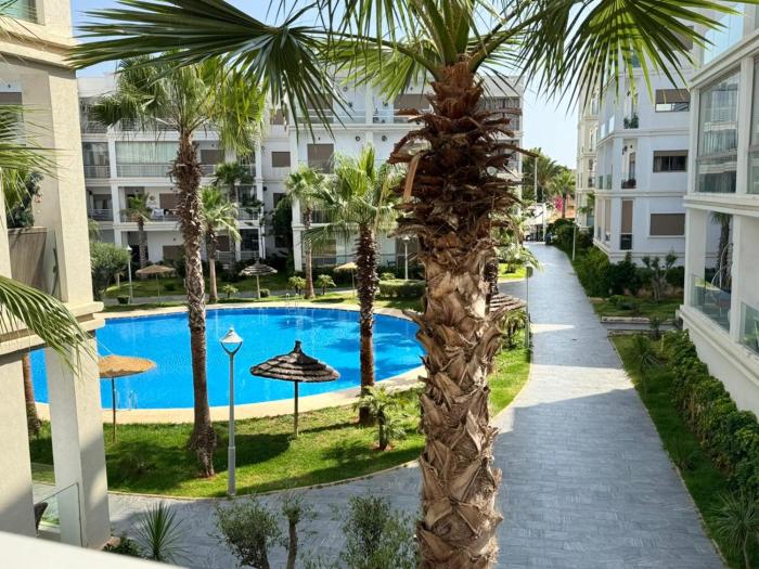Bel appartement à Bouznika Résidence avec piscine à 5 min de la plage