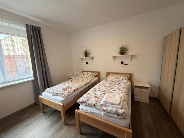 Přízemní moderní byt 2kk s výhledem do zahrady