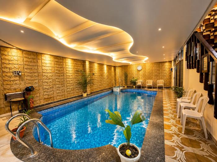 HOTEL SWIMMING POOL - SIVEE INN- Near Kashi Vishwanath Temple & Ganga Ghat - Free Wi-Fi - near Hotel Avyaan Palace -Room Service & Warm Hospitality - BEST HOTEL IN VARANASI