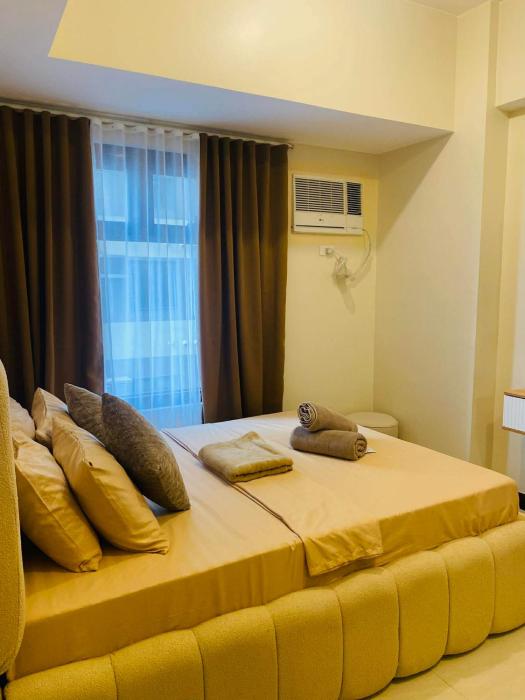 Cozy R&R Suite Aurora Escalades Cubao