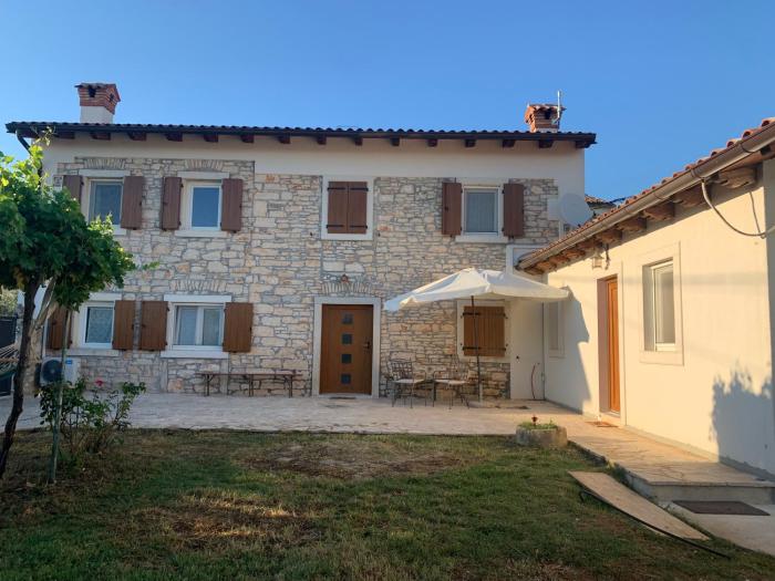 Casa per 6 persone con giardino e portico