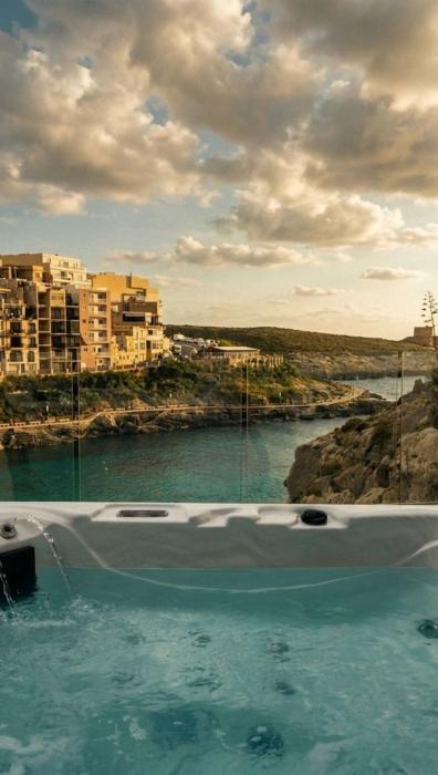 Waters Edge Suite Xlendi Direct Seafront with Private Roof Top Jacuzzi