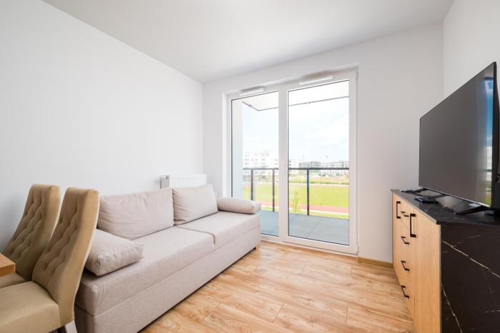 Heweliusza 8 Homely Apartment by BookingHost