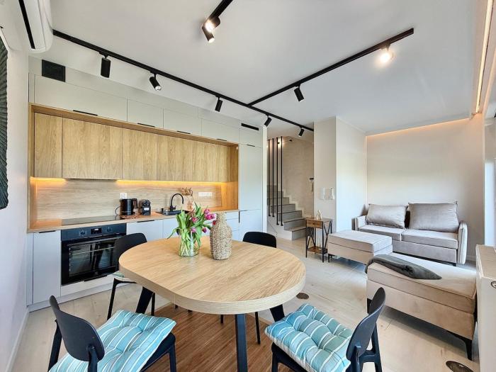 Dwupoziomowy apartament Lumiere w centrum