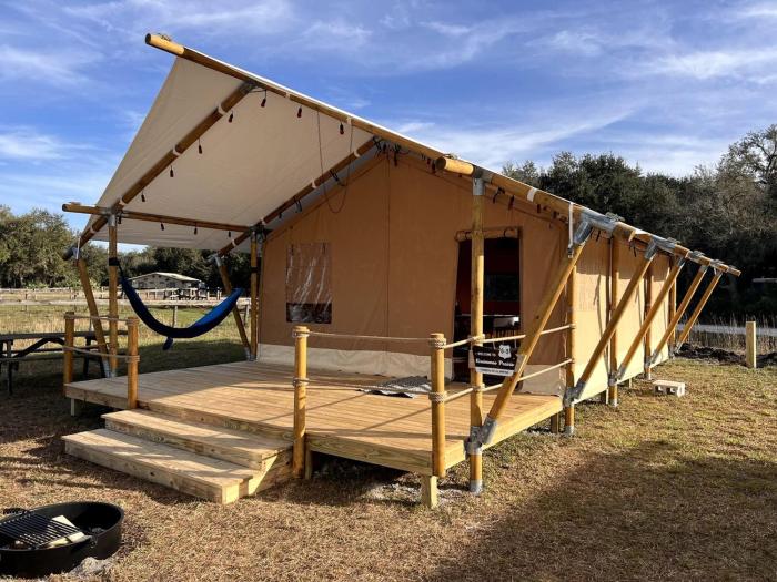 Spacious Deluxe Safari Tent with Fire Pit & BBQ Grill in Basinger, Florida