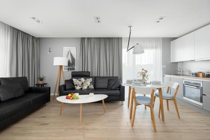 Przytulne i Nowoczesne Apartamenty Sun Seasons 24 w Dziwnowie z Parkingiem by Noclegi Renters