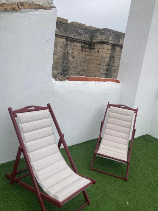 Appartement intramuros avec patio et terrasse