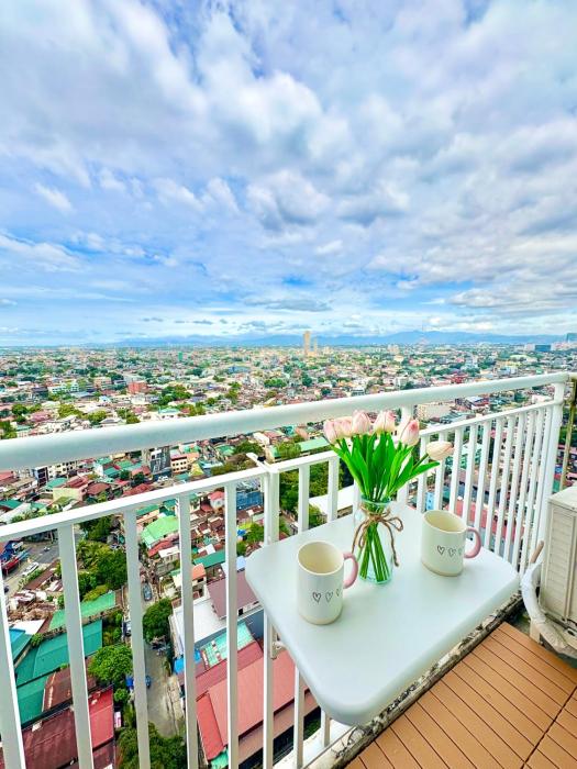 Petite Maison Rose Suite with Balcony at The Grass Residences