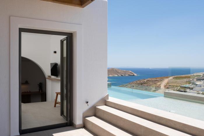 Ios Panoramic Sea view stylish suite with pool