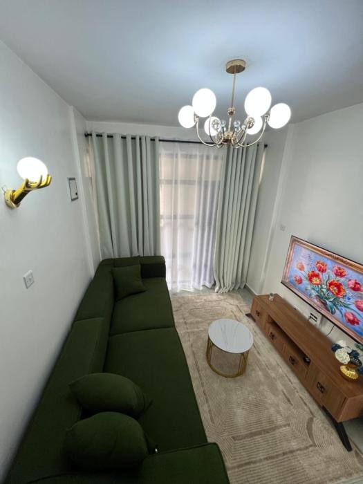 Cozy Modern 1BR with views on 10th floor at TSAVO APARTMENTS near TRM 15 mins to CBD