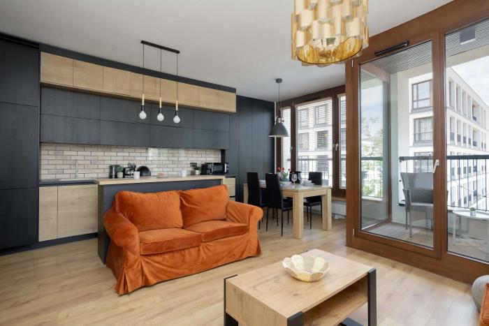 Air-Conditioned Apartment with Parking and Balcony by Noclegi Renters