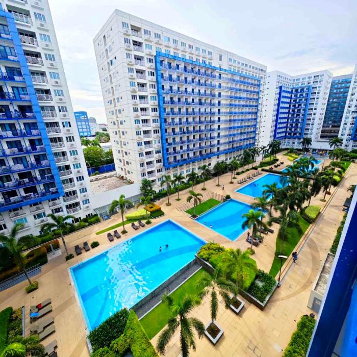 Sea Residences by Fernan 5-Min Walk to MOA Netflix Fast Wi-Fi Pool View