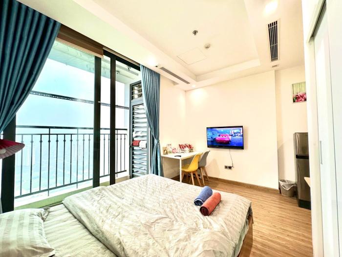Sunset Skyline Apartment with Balcony and City Lights Panorama