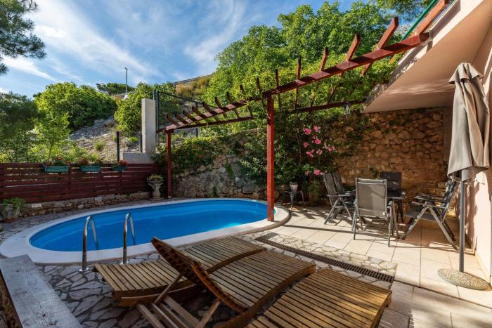 Seaside apartments with a swimming pool Medici, Omis - 7461