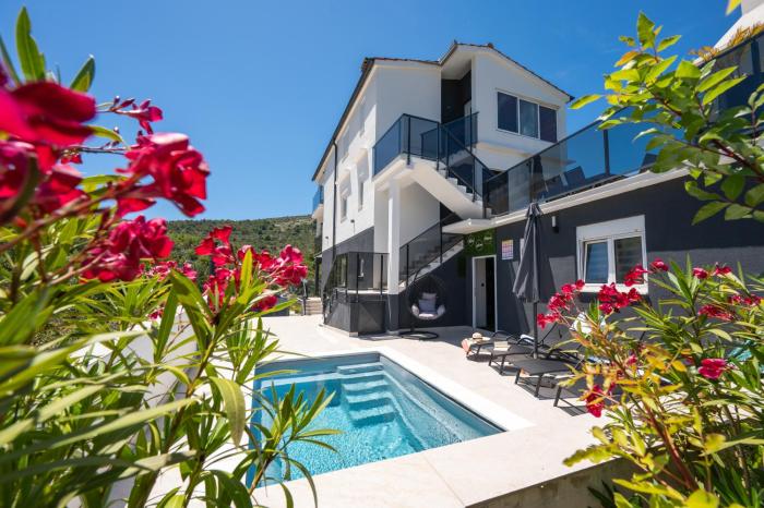 Beachfront Villa Marivi with Pool, Jacuzzi and Game Room