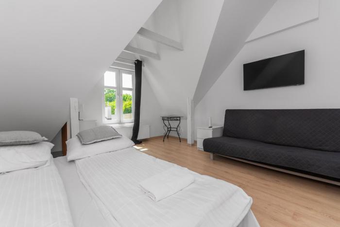 Sobieskiego 3 by Grand Apartments