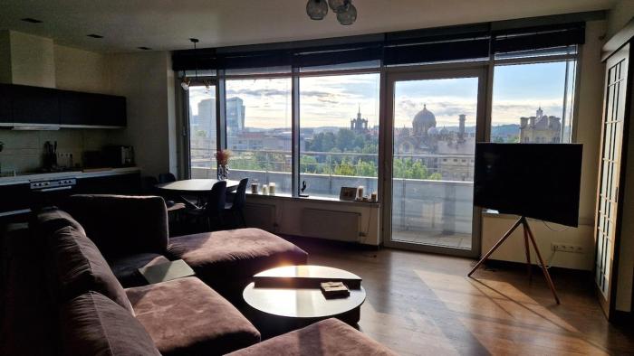 Modern skyline-view condo at a luxury complex