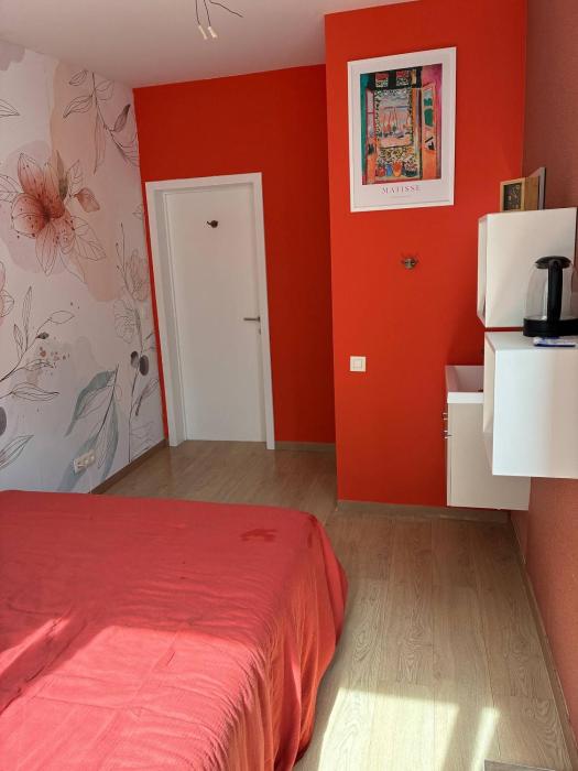 Tastefully-decorated bedroom with garden access