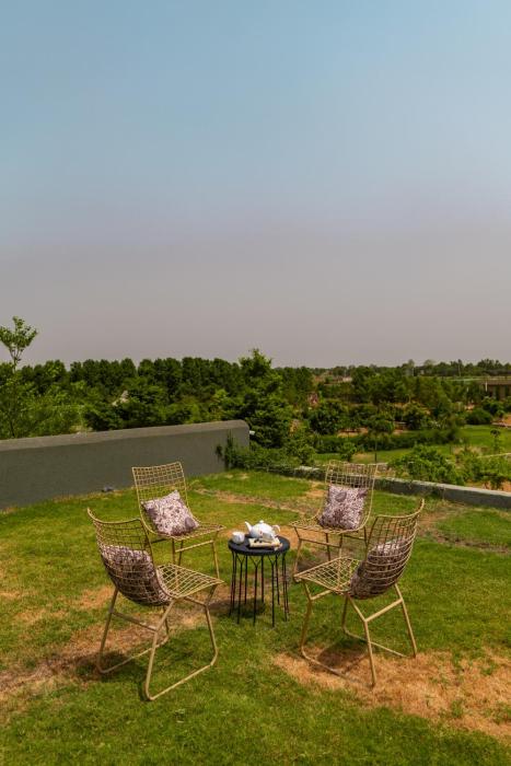Earthstone 4-BHK Stone-Clad Villa with Private Pool, Terrace Garden & Gazebo