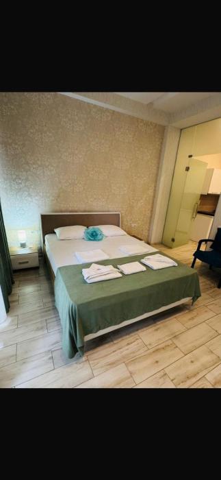 Private One-Bedroom Apartment with kitchen and balcony at a Hotel