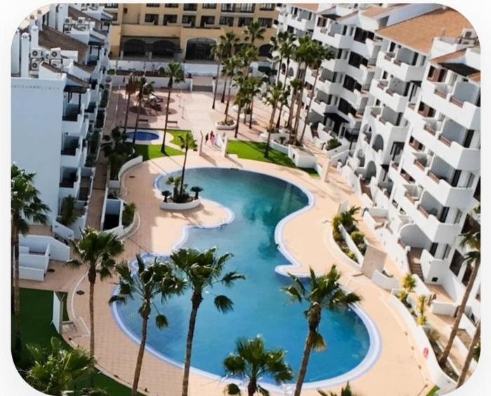 Ground floor apartment with pool In front of the golf course