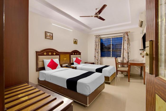 Capital O Elegant Amethyst Business Hotel Near Ragigudda Sri Prasanna Anjaneyaswamy Temple