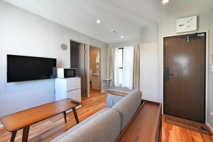 ZJ401 Top-Floor 1BR Home with Living Room and Kitchen, Double Bed and Sofa Bed