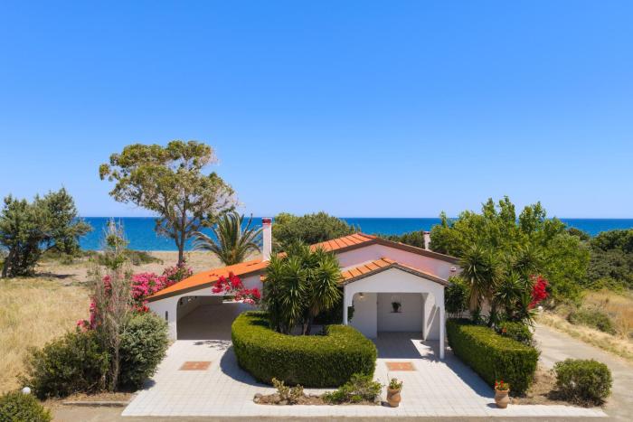Beach House By The Sea