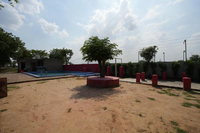 Rupani Dhani Farmhouse by Belmore