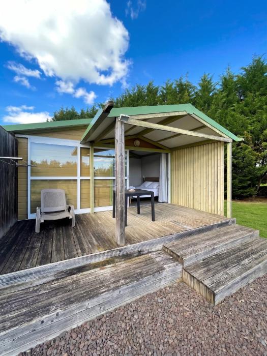 Chalet cosy avec accès piscine partagée