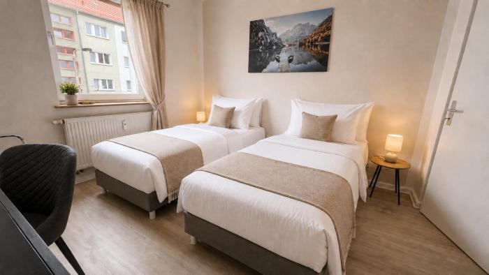 2min Fußweg vom Bahnhof, Ferienwohnung mit Balkon, Wifi, Smart TV, Hotel-Boxspringbetten