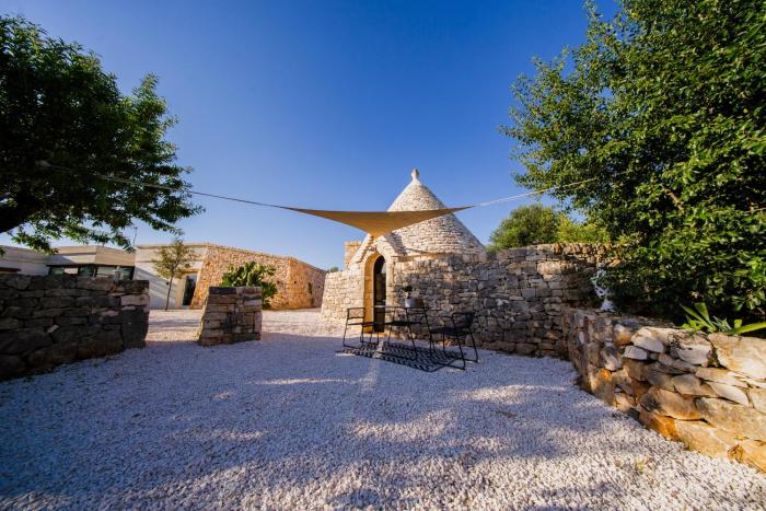 Trullo indipendente con uso piscina a Marchione Piccolo