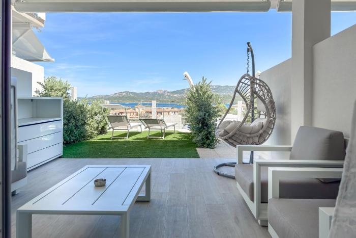 Domusmeralda - Corallo - Appartamento con Giardino, Piscina e vista Mare